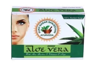 Herbal Aloe Vera soap with aloe vera plant and a woman's face for skincare.