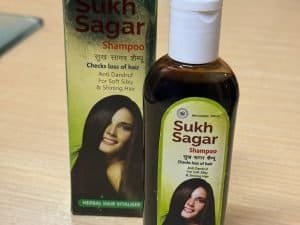 Sukh Sagar Shampoo for hair fall control and dandruff relief.